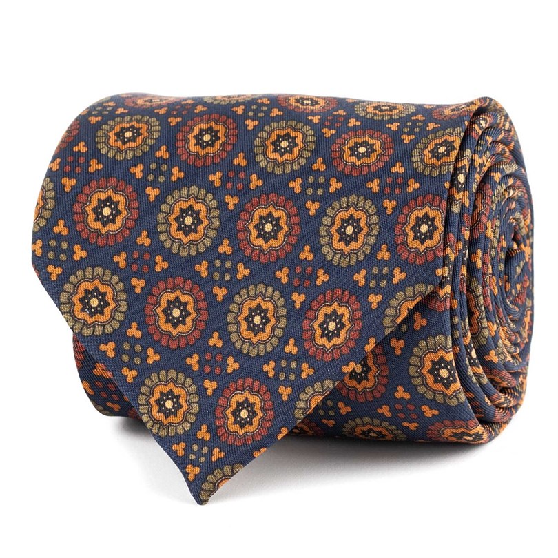 Cravatta in twill di seta blu con stampa geometrica