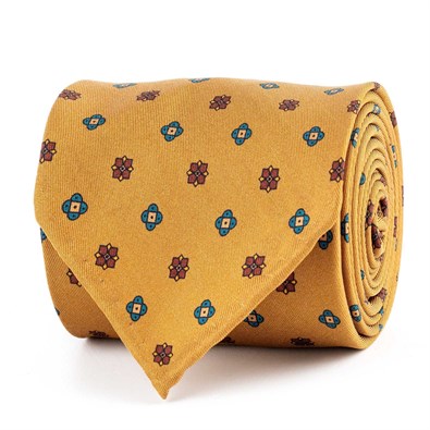 Ocher silk twill tie with geometric print