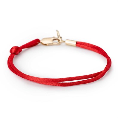 Red silk bracelet with gold horn charm